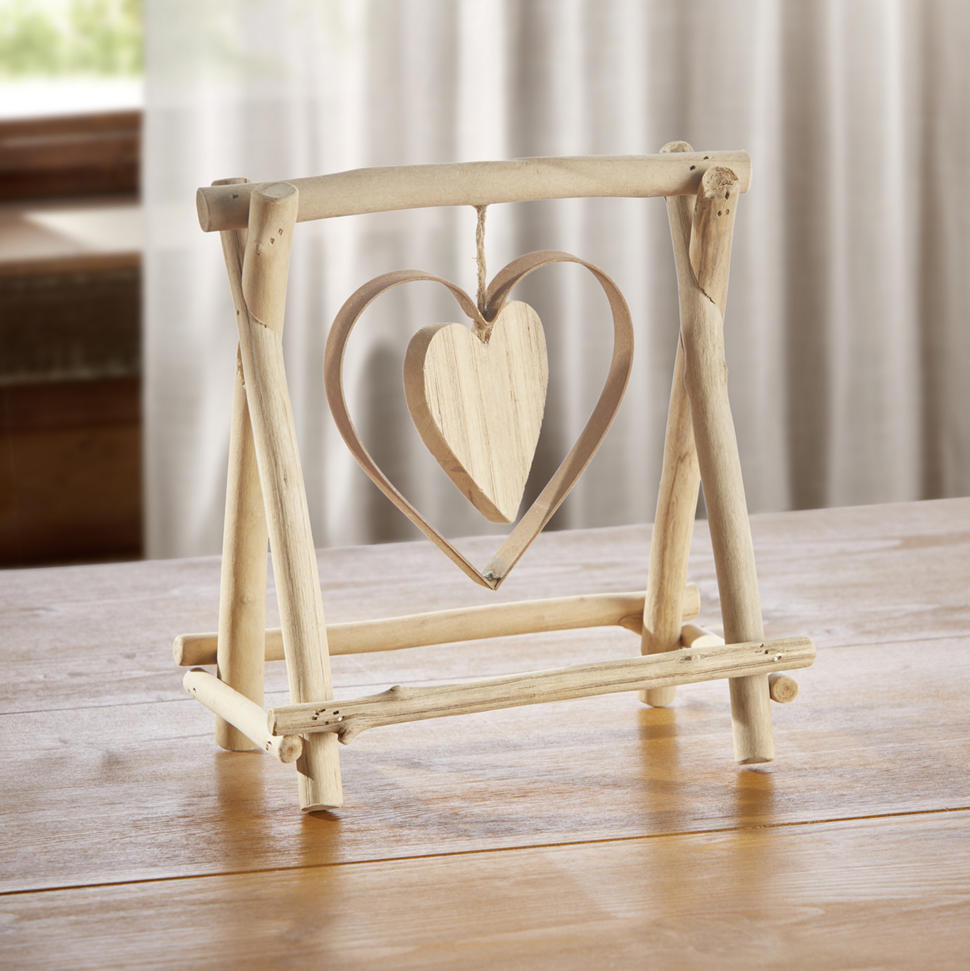Acheter Décoration en bois "cœur qui swingue"  dans la boutique en ligne de Frank Flechtwaren
