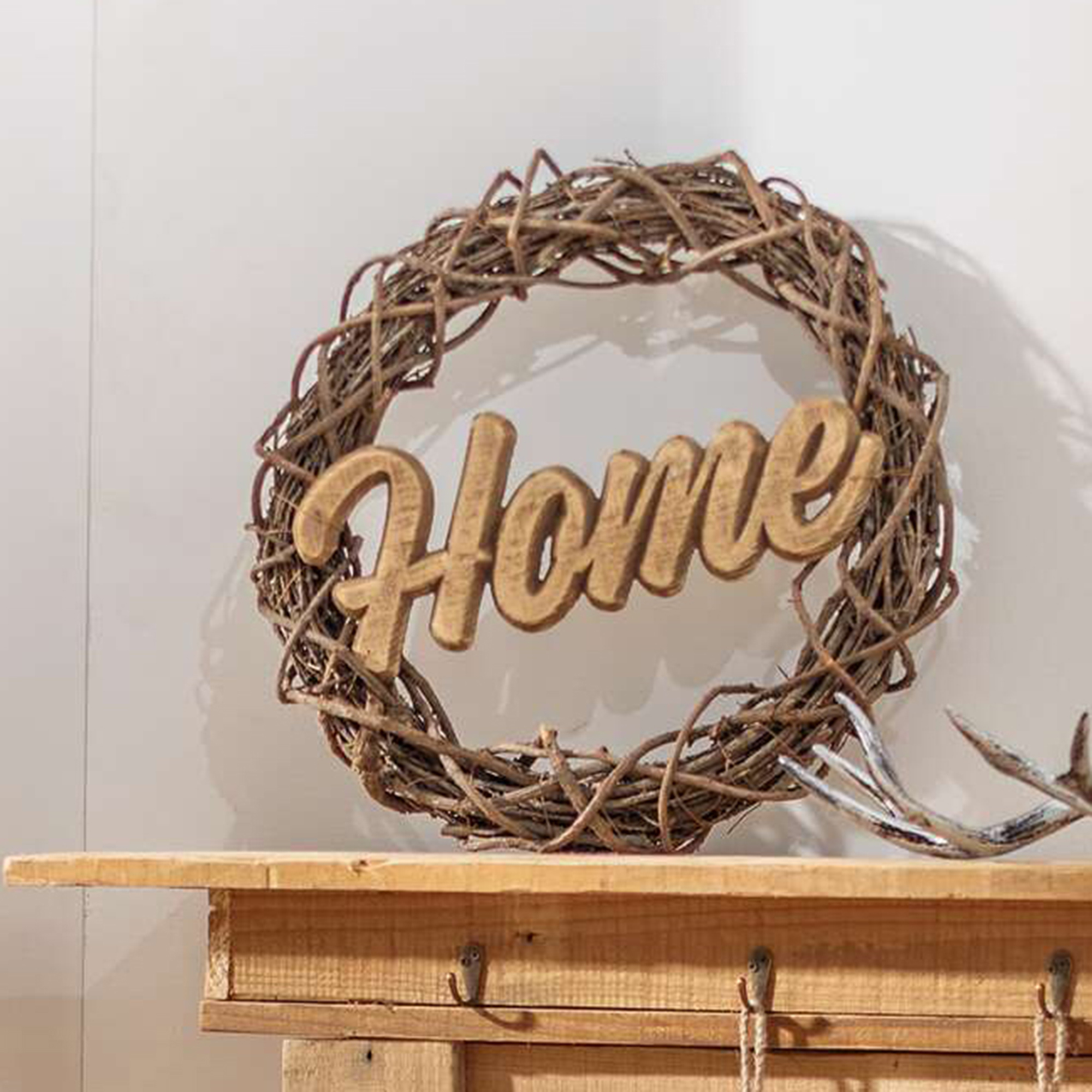 Acheter Couronne "Home"  dans la boutique en ligne de Frank Flechtwaren